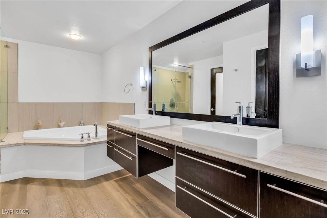 8925 West Flamingo Road, Unit 201 Las Vegas, NV 89147 - Photo 19 of 47 Primary bath area boasts a large walk-in closet not shown in photos