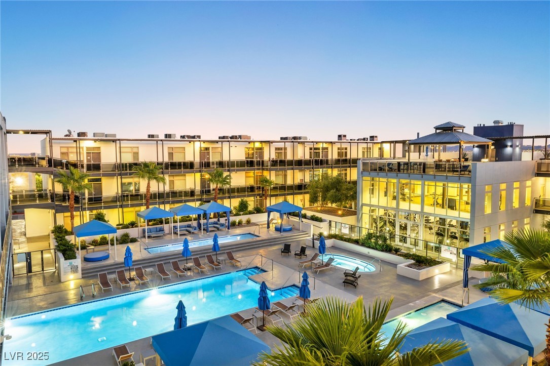 8925 West Flamingo Road, Unit 201 Las Vegas, NV 89147 - Photo 26 of 47 Casino style pool, cabanas, and two story fitness center right outside your door