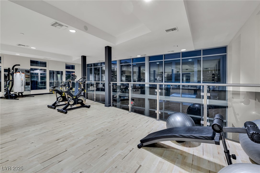 8925 West Flamingo Road, Unit 201 Las Vegas, NV 89147 - Photo 28 of 47 Top floor of fitness center has overlook balcony to pool view, spinning, boxing, and more fitness equipment