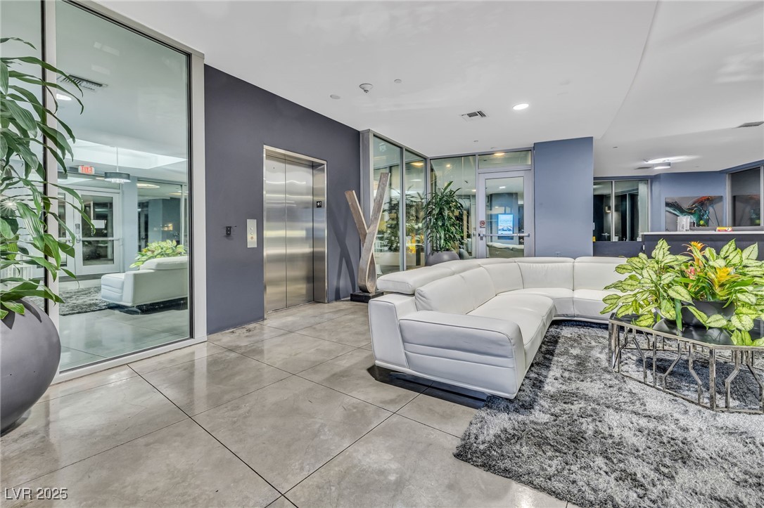 8925 West Flamingo Road, Unit 201 Las Vegas, NV 89147 - Photo 3 of 47 Luxurious lobby and elevators are found throughout the property for ease of movement