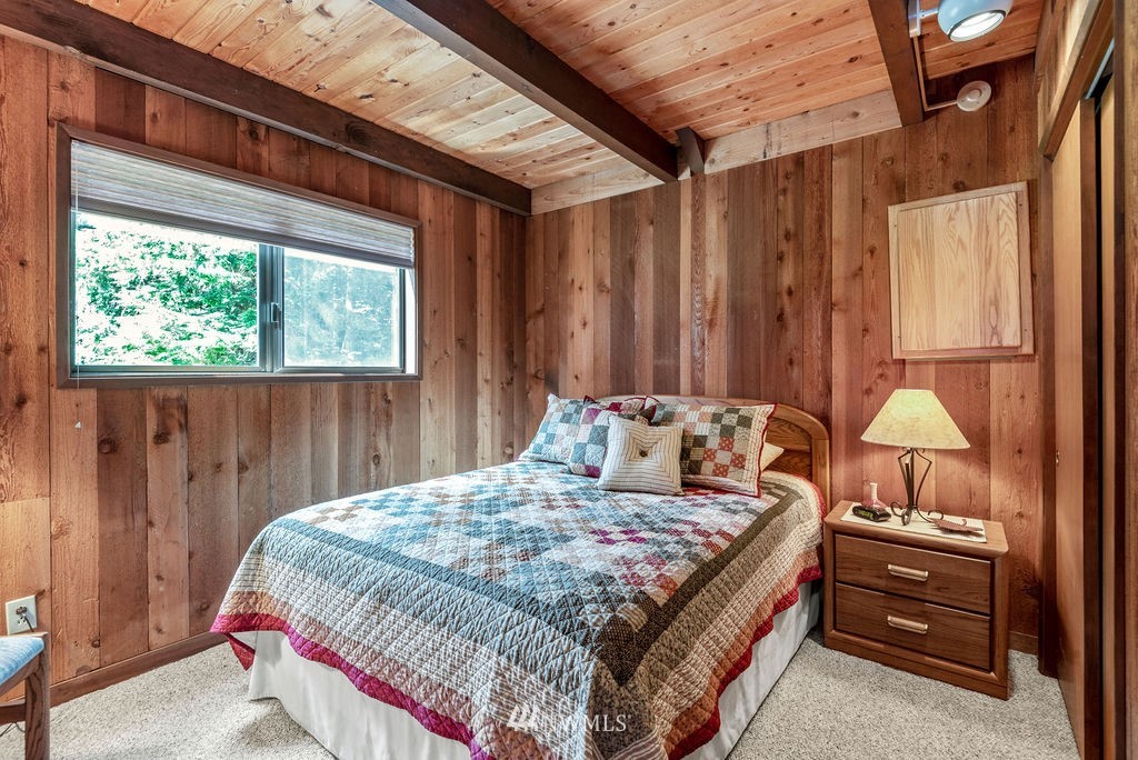 650 Frank Smith Road Toutle, WA 98649 - Photo 30 of 37 a bedroom with a bed and a window
