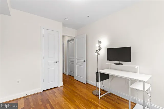 a view of an empty room with a window