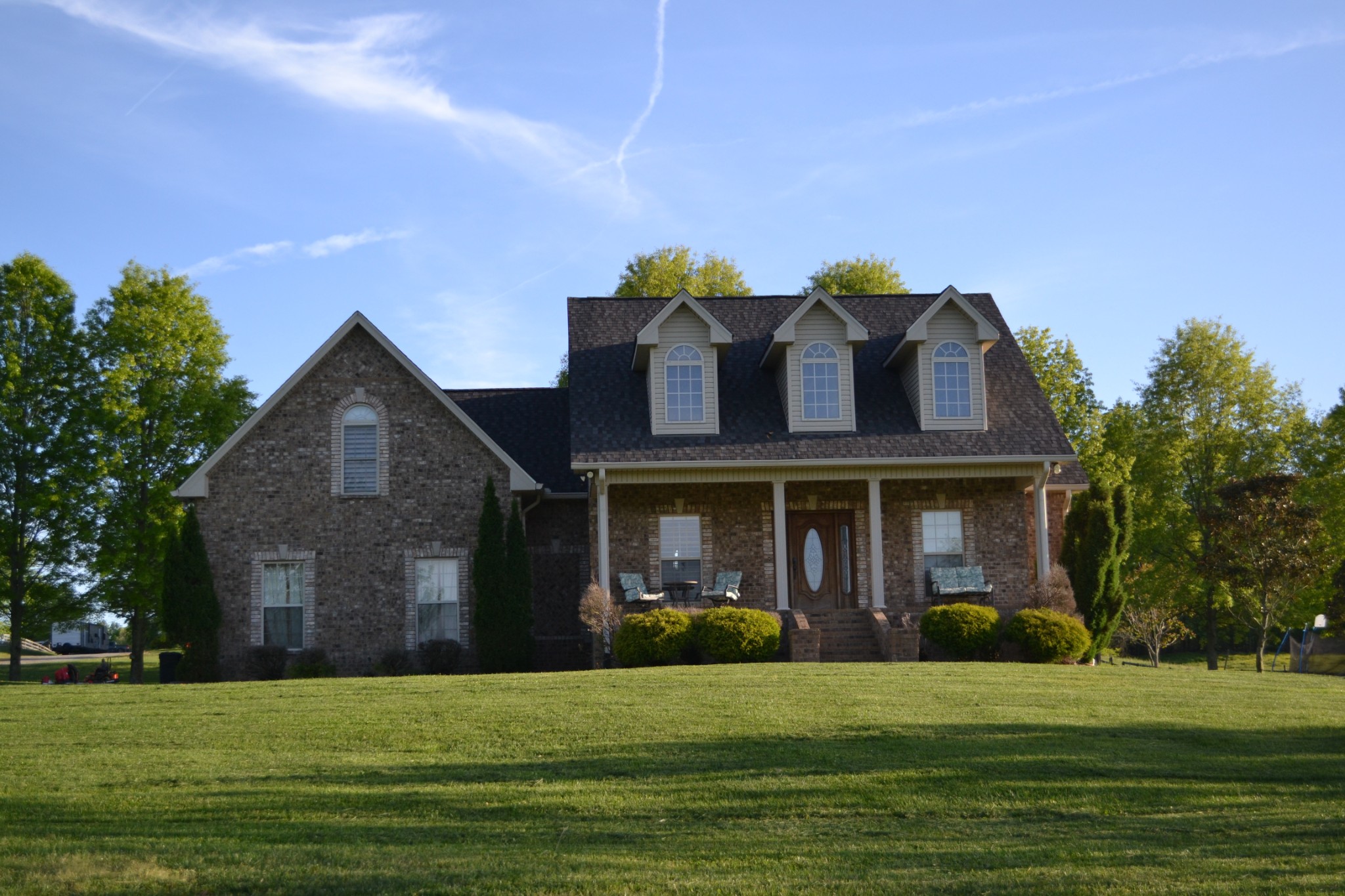 7015 Bethlehem Road Springfield, TN 37172 - Photo 1 of 10 a front view of a house with a garden