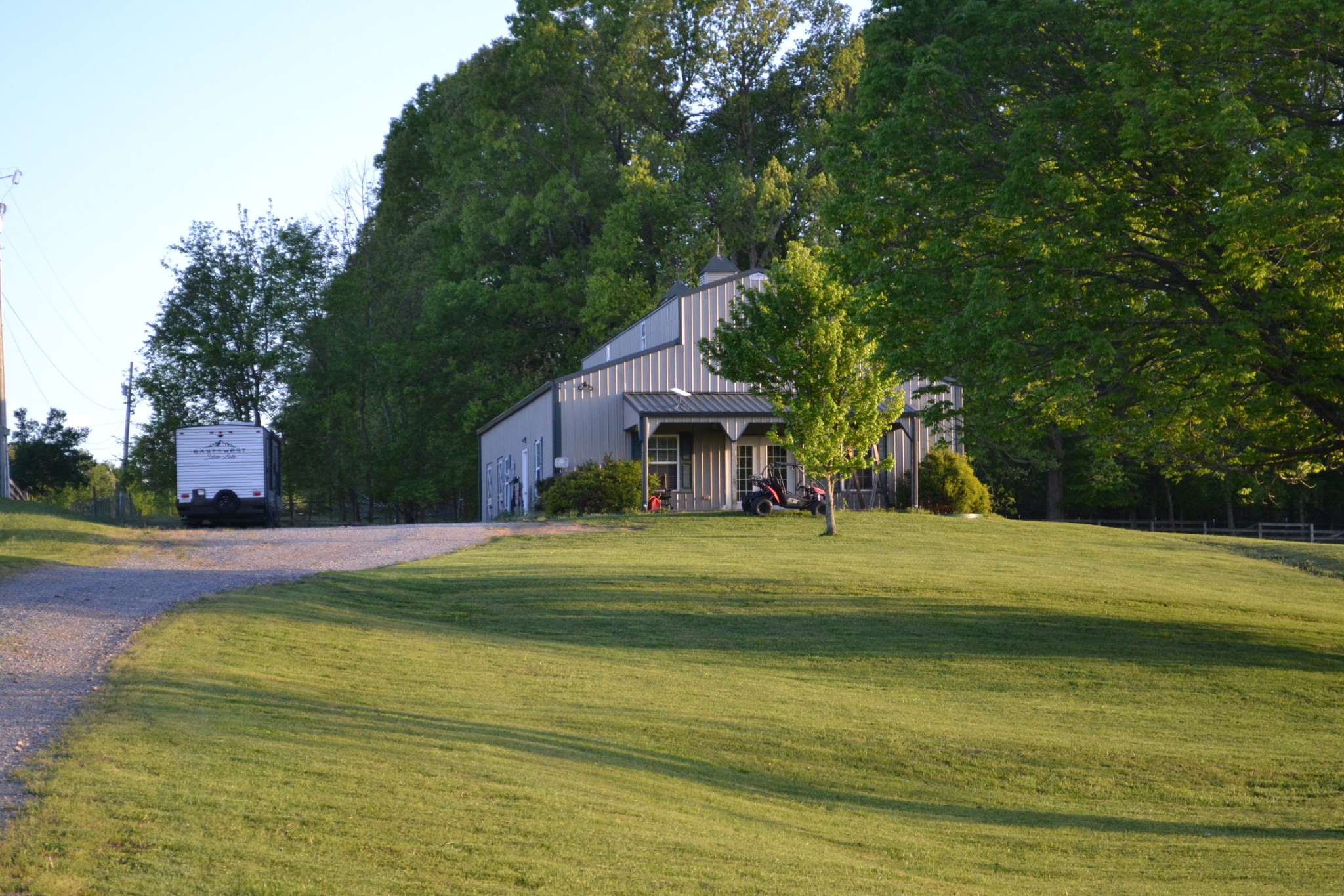 7015 Bethlehem Road Springfield, TN 37172 - Photo 8 of 10 a front view of a house with a yard and trees