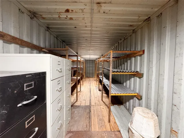 a view of a balcony with chairs