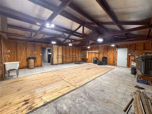 a view of a room with wooden furniture