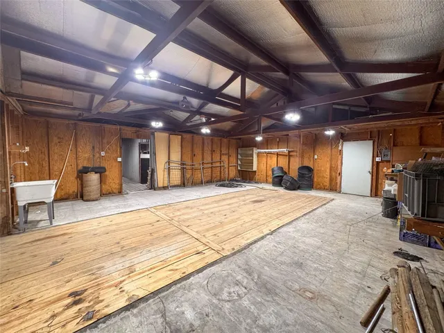 a view of a room with wooden furniture