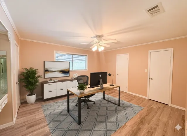 a workspace with furniture window and wooden floor