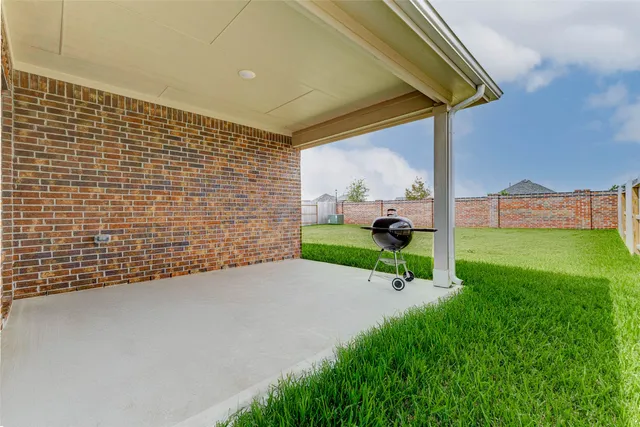 a view of a garden with a bench