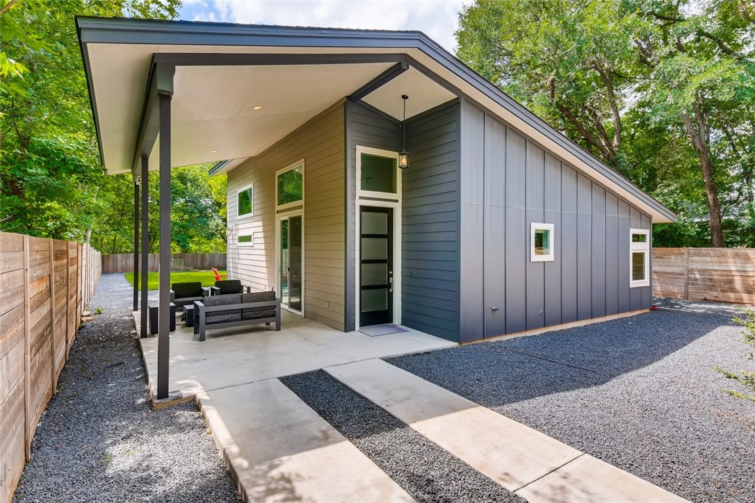 1142 Eleanor Street, Unit 2 Austin, TX 78721 - Photo 1 of 1 a backyard of a house with seating space