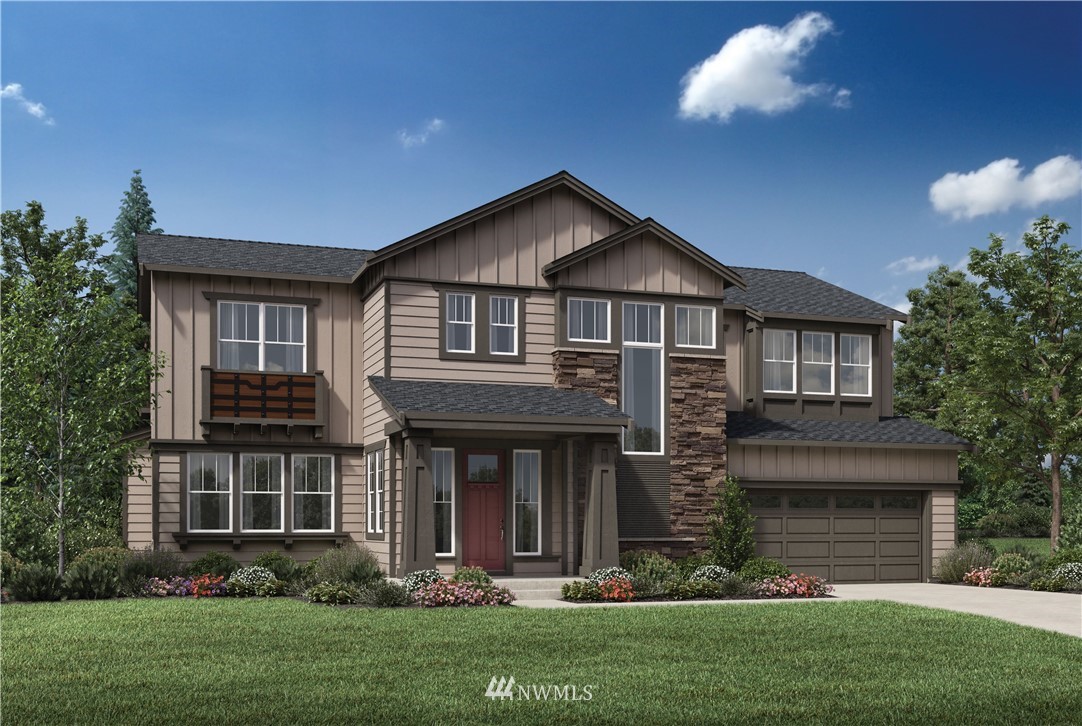35 232nd Place Southeast Bothell, WA 98021 - Photo 1 of 24 a front view of a house with a garden and plants