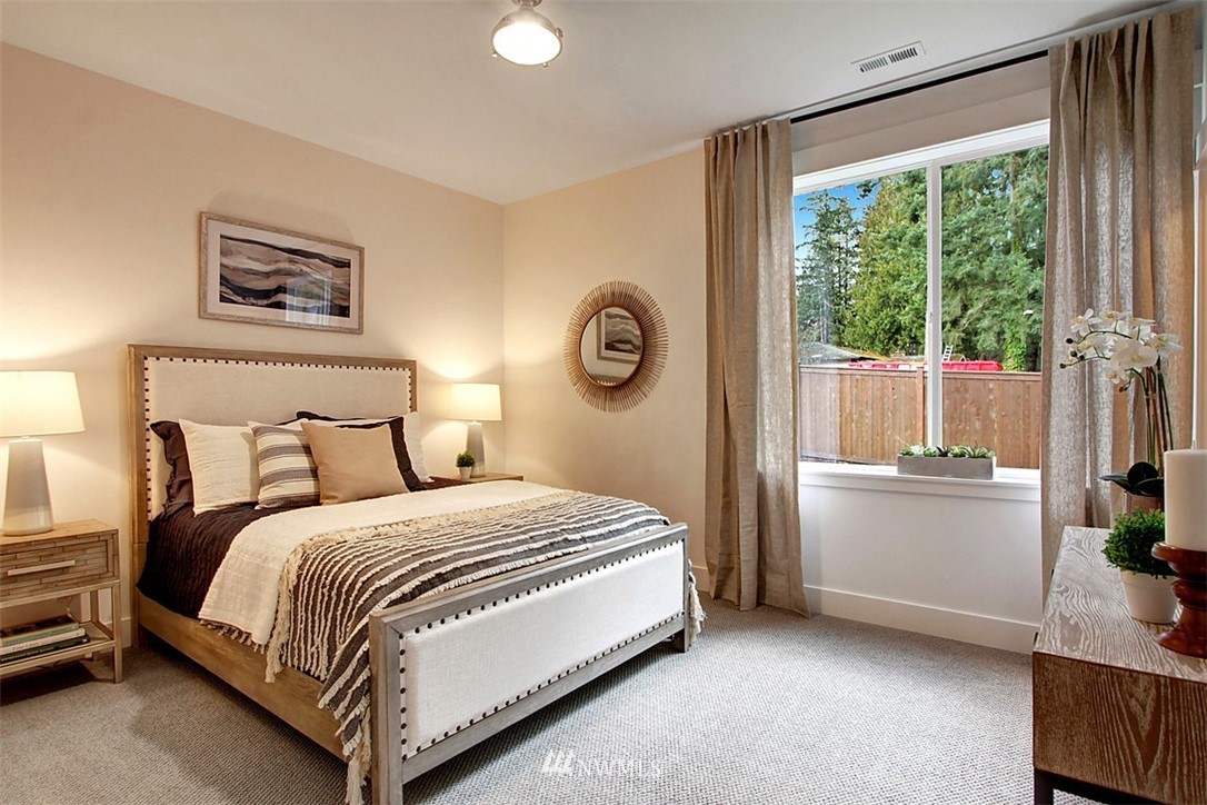 35 232nd Place Southeast Bothell, WA 98021 - Photo 12 of 24 a bedroom with a bed and a window