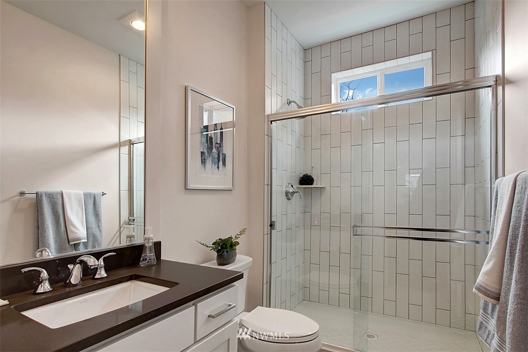 35 232nd Place Southeast Bothell, WA 98021 - Photo 13 of 24 a bathroom with a sink a toilet and shower
