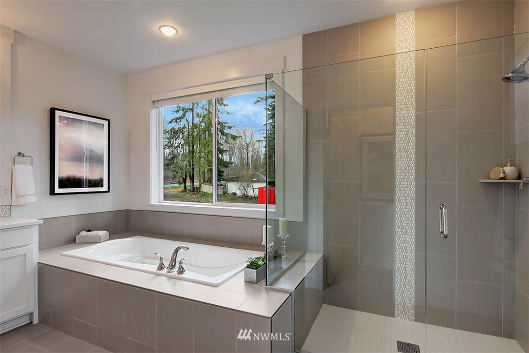 35 232nd Place Southeast Bothell, WA 98021 - Photo 18 of 24 a bathroom with a bathtub and a sink