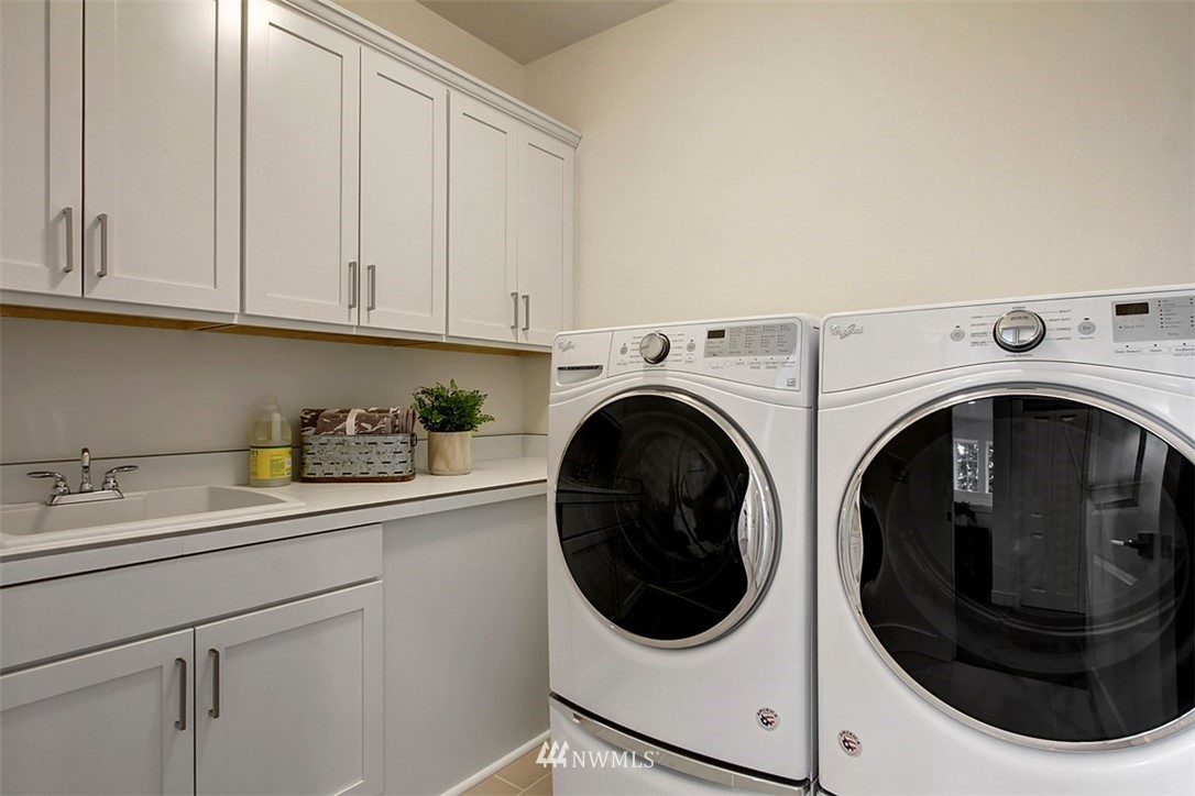 35 232nd Place Southeast Bothell, WA 98021 - Photo 19 of 24 a utility room with dryer and washer