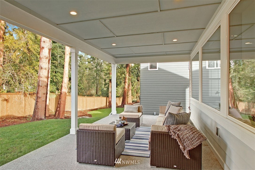 35 232nd Place Southeast Bothell, WA 98021 - Photo 9 of 24 a living room with furniture and a garden