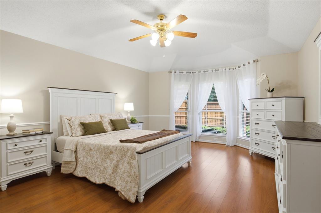 4218 Glistening Spring Rowlett, TX 75088 - Photo 17 of 39 Vaulted ceiling featuring a ceiling fan with integrated lighting