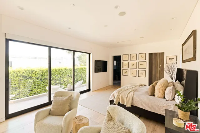 a bathroom with a bathtub and a sink
