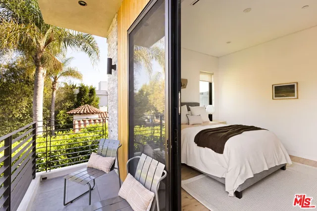 a view of workspace with wooden floor and windows