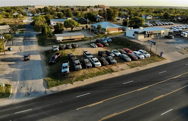 a view of street and shops