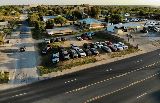 a view of street and shops