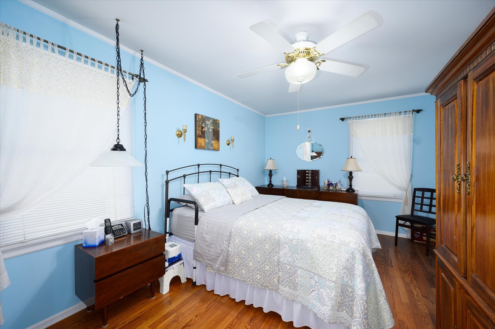 1512 Herbert Avenue Berkeley, IL 60163 - Photo 13 of 33 a bedroom with a bed and a chandelier