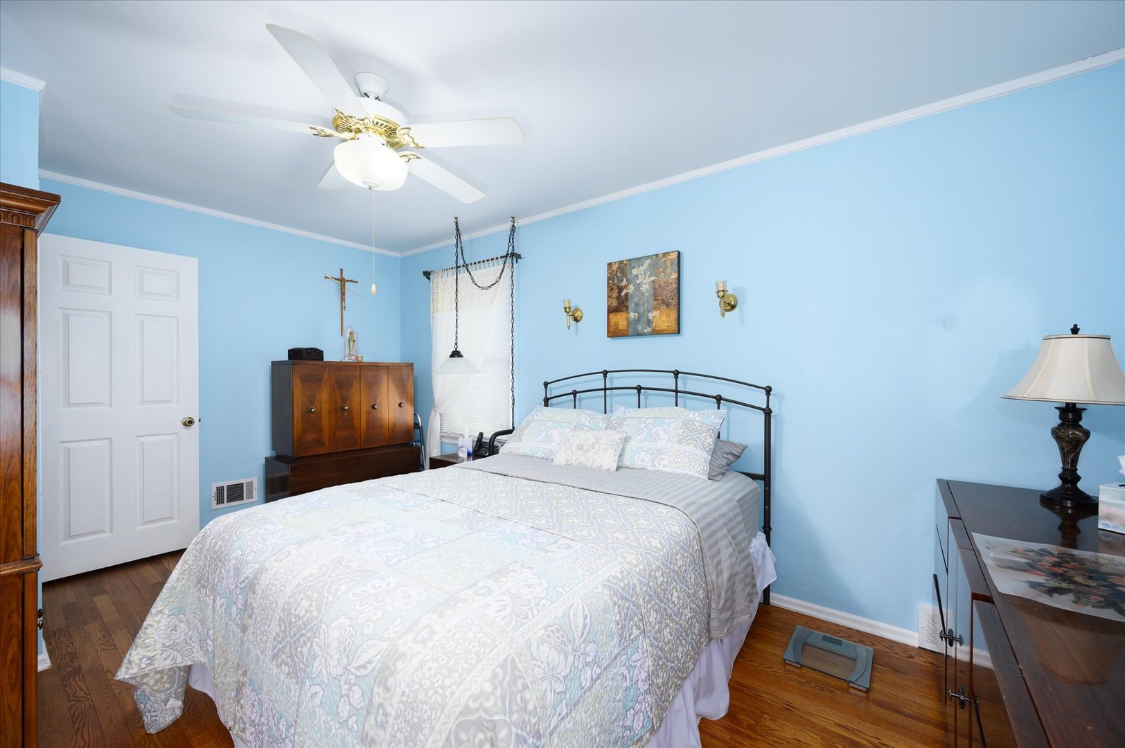 1512 Herbert Avenue Berkeley, IL 60163 - Photo 14 of 33 a bedroom with a bed and a chandelier