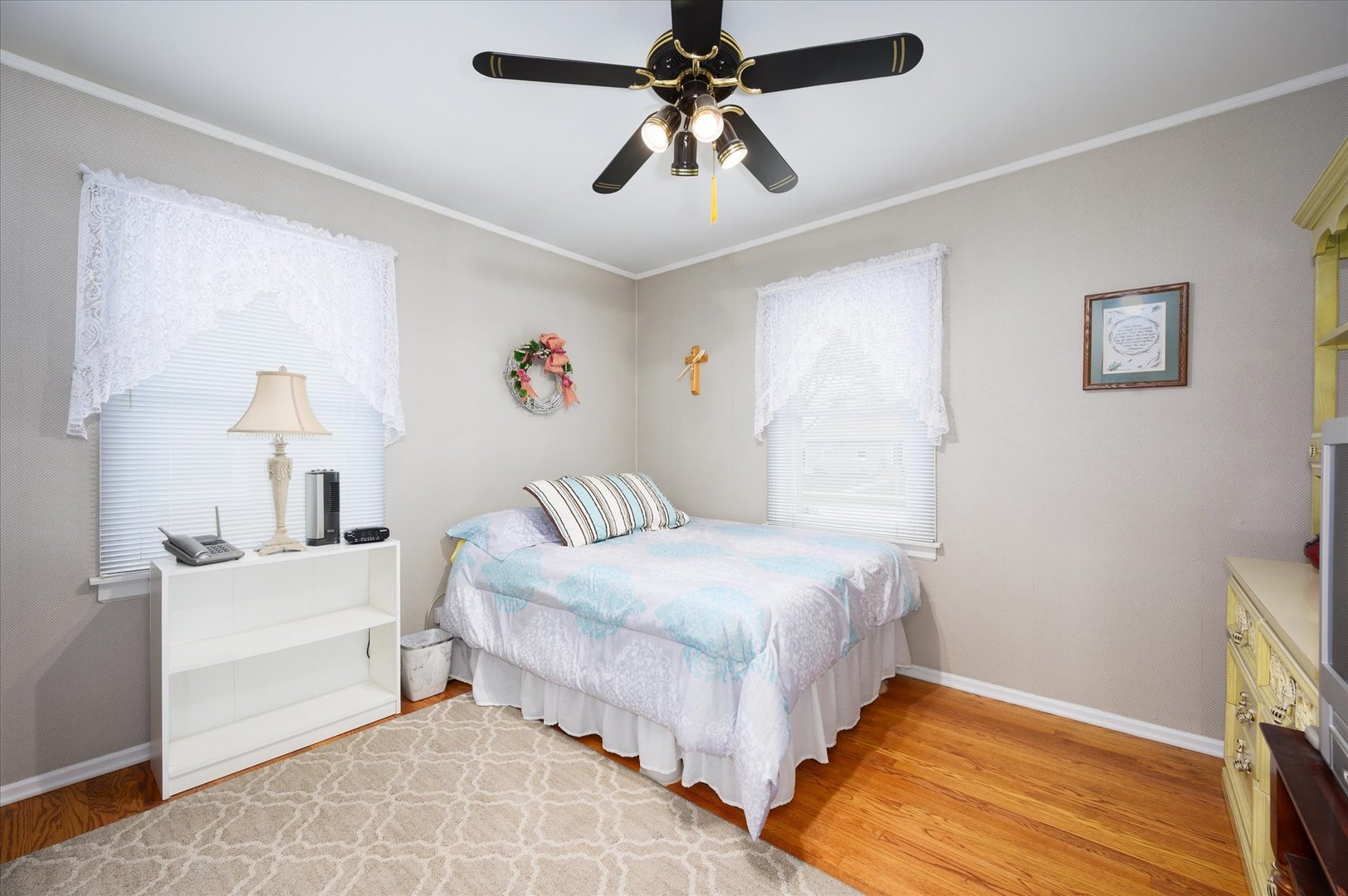 1512 Herbert Avenue Berkeley, IL 60163 - Photo 18 of 33 a bedroom with a bed and a chandelier