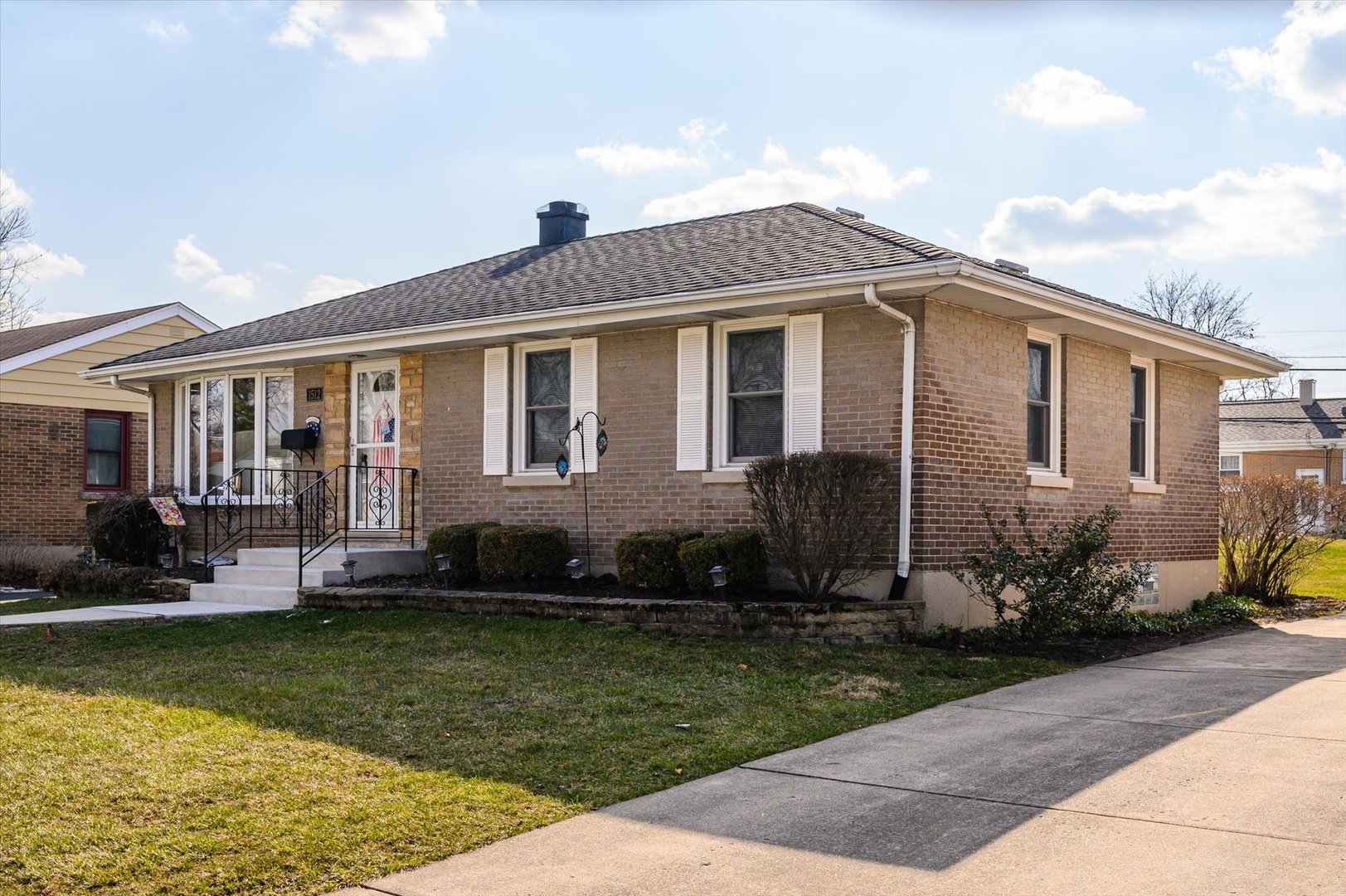 1512 Herbert Avenue Berkeley, IL 60163 - Photo 4 of 33 a front view of a house with a yard