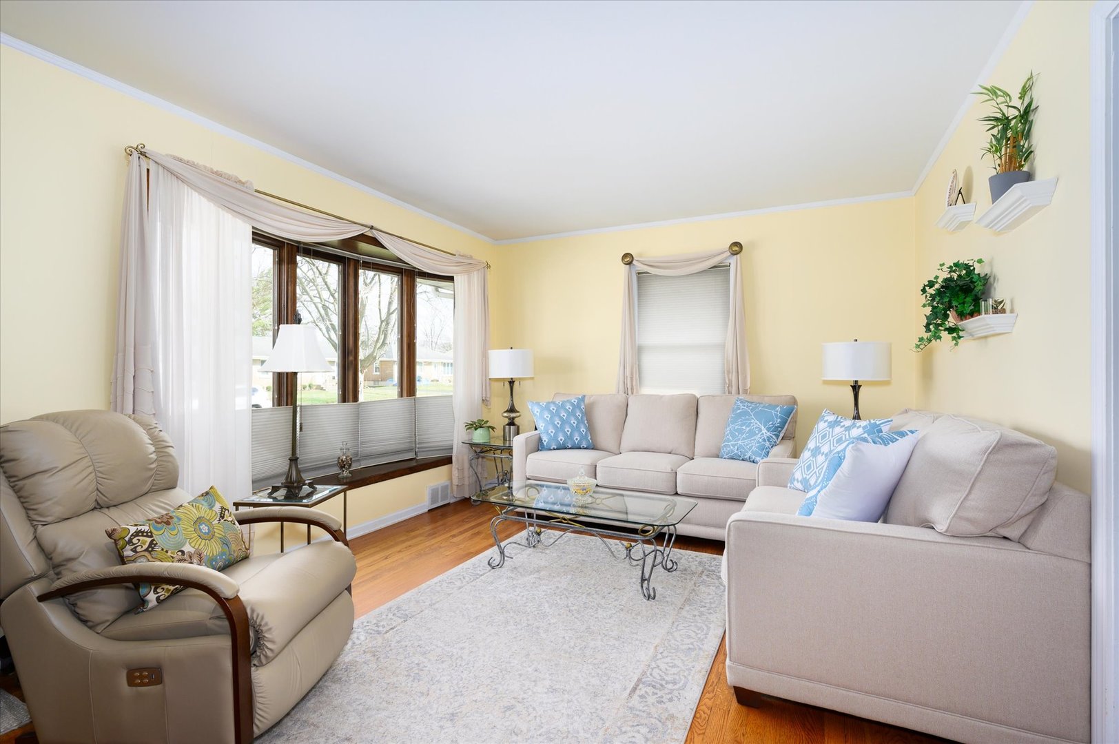 1512 Herbert Avenue Berkeley, IL 60163 - Photo 7 of 33 a living room with furniture and a large window