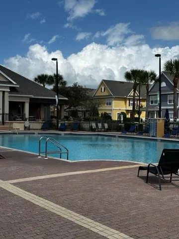 a view of multiple houses with a yard