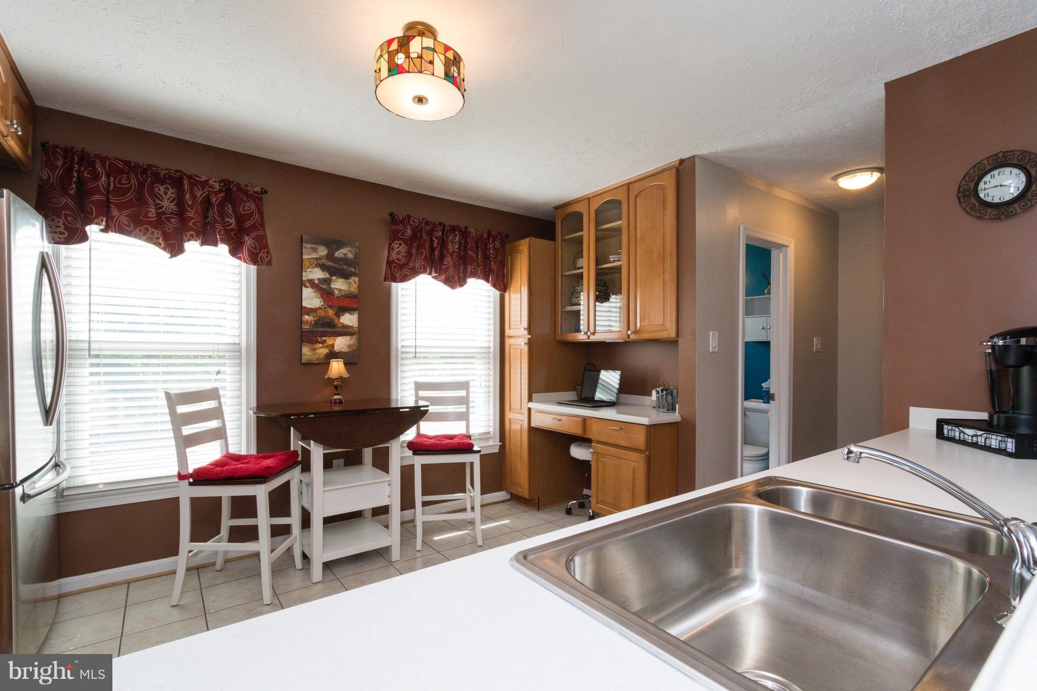 7381 Stream Way Springfield, VA 22152 - Photo 13 of 26 Spacious kitchen w/ built in desk space