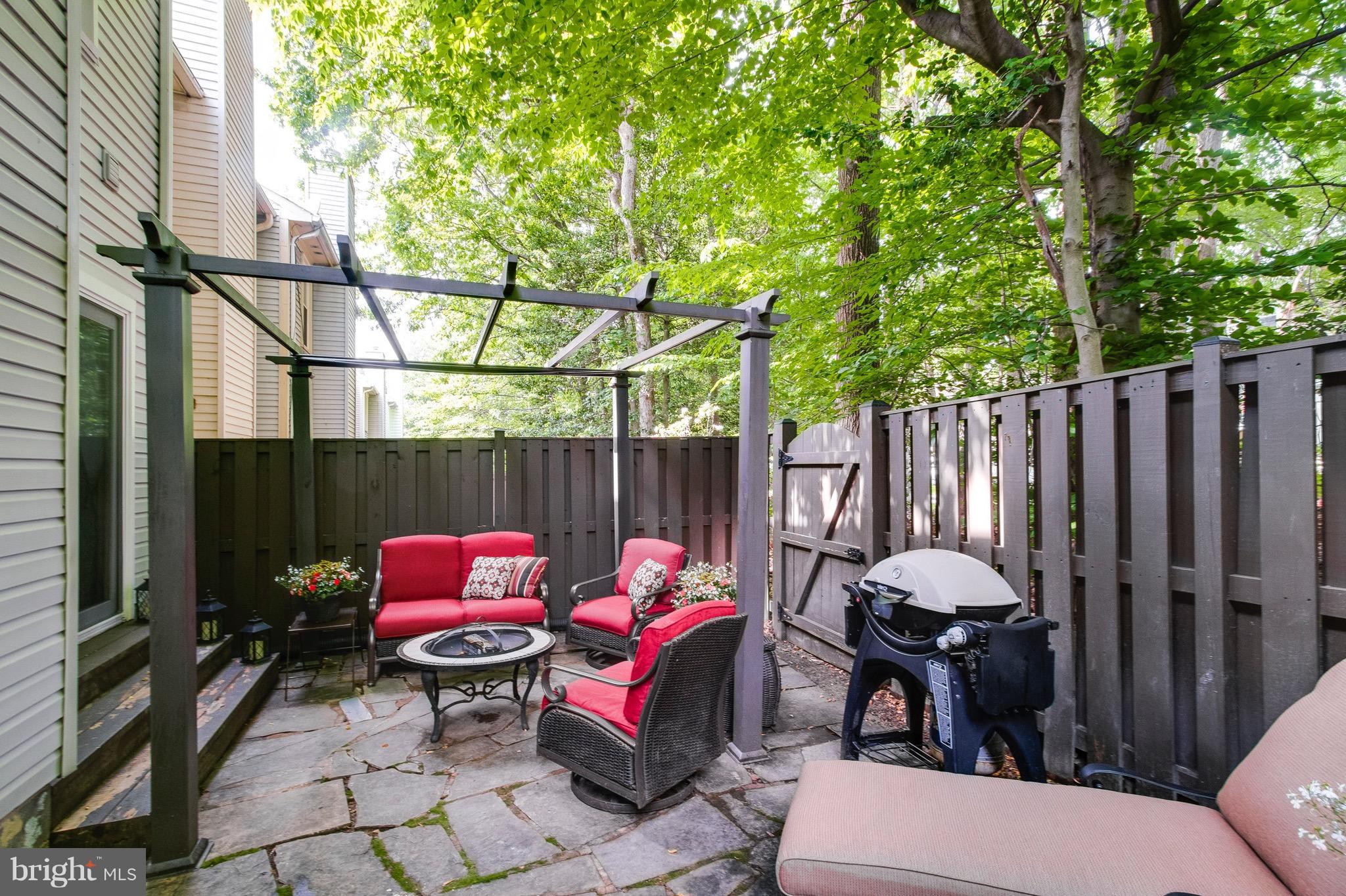 7381 Stream Way Springfield, VA 22152 - Photo 25 of 26 Flagstone patio, private fence, backs to woods