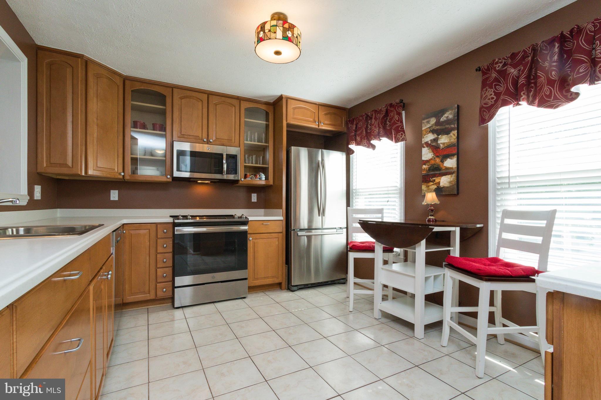 7381 Stream Way Springfield, VA 22152 - Photo 10 of 26 Enjoy all new appliances in this renovated kitchen
