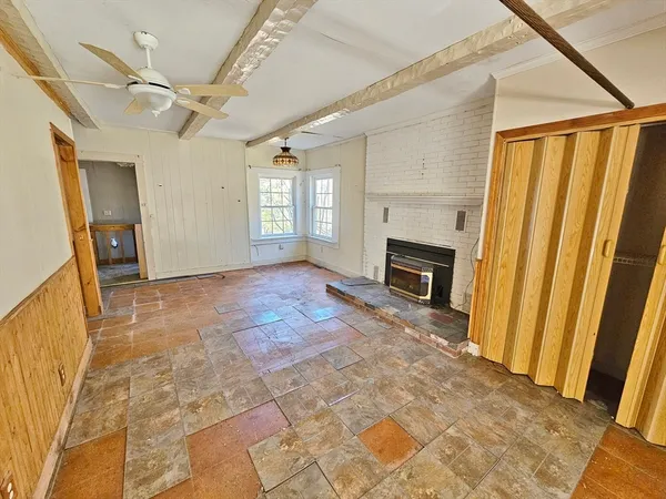 an empty room with a large window