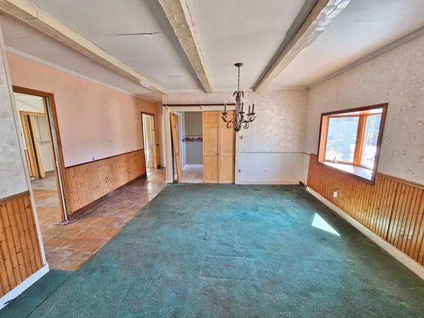 a view of livingroom with hardwood floor and a ceiling fan