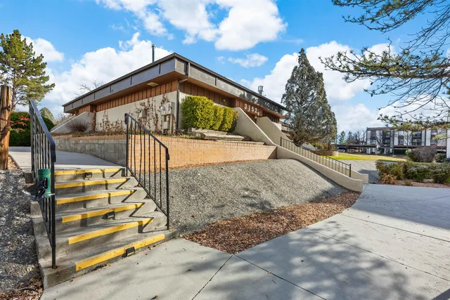 a view of staircase going to house