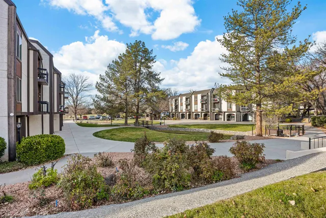 a view of a swimming pool with a patio