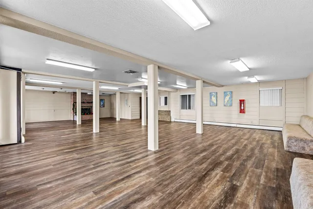 wooden floor with white walls and wooden floors