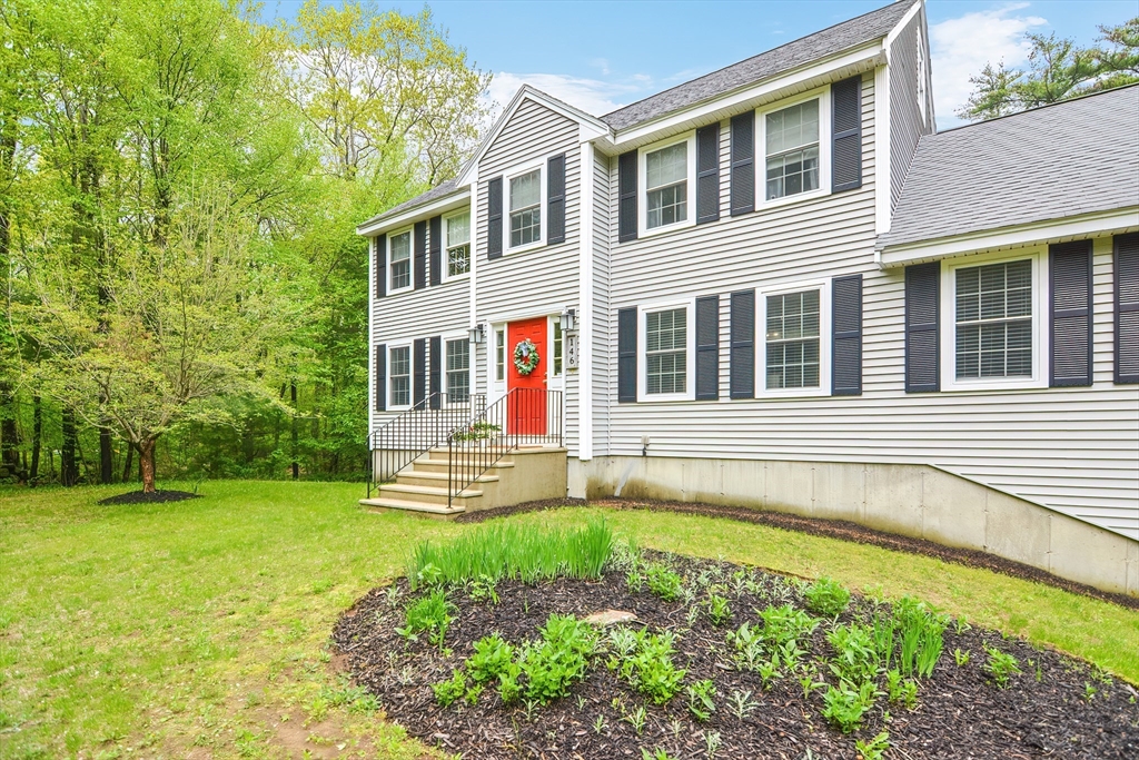 146 Gray Road Templeton, MA 01468 - Photo 1 of 37 a front view of a house with a yard