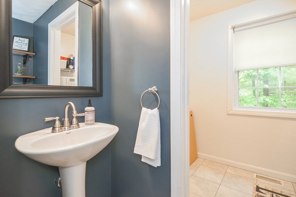 146 Gray Road Templeton, MA 01468 - Photo 15 of 37 a bathroom with a sink and a mirror