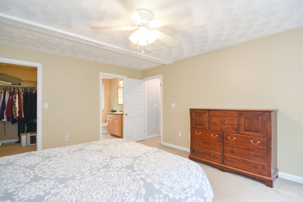 146 Gray Road Templeton, MA 01468 - Photo 20 of 37 a bedroom with a bed and a dresser