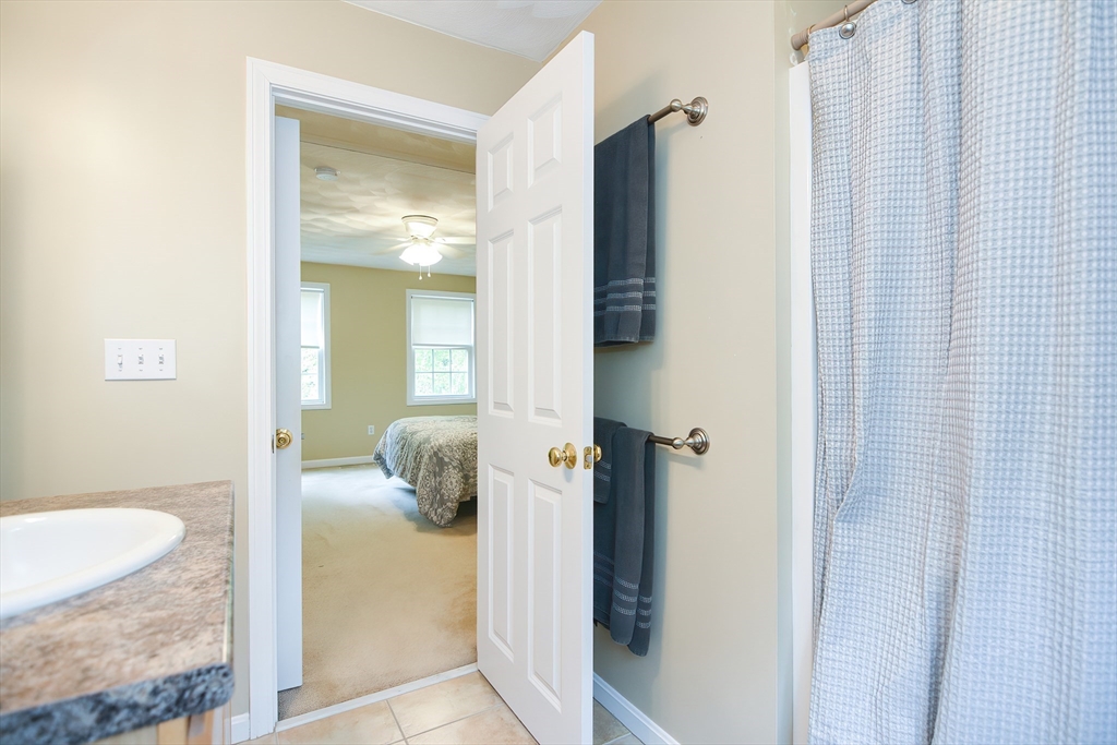 146 Gray Road Templeton, MA 01468 - Photo 28 of 37 a bathroom with a granite countertop sink and a mirror