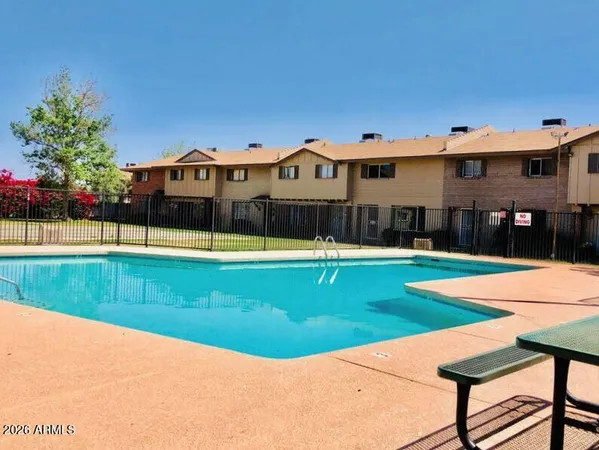 a view of a house with swimming pool