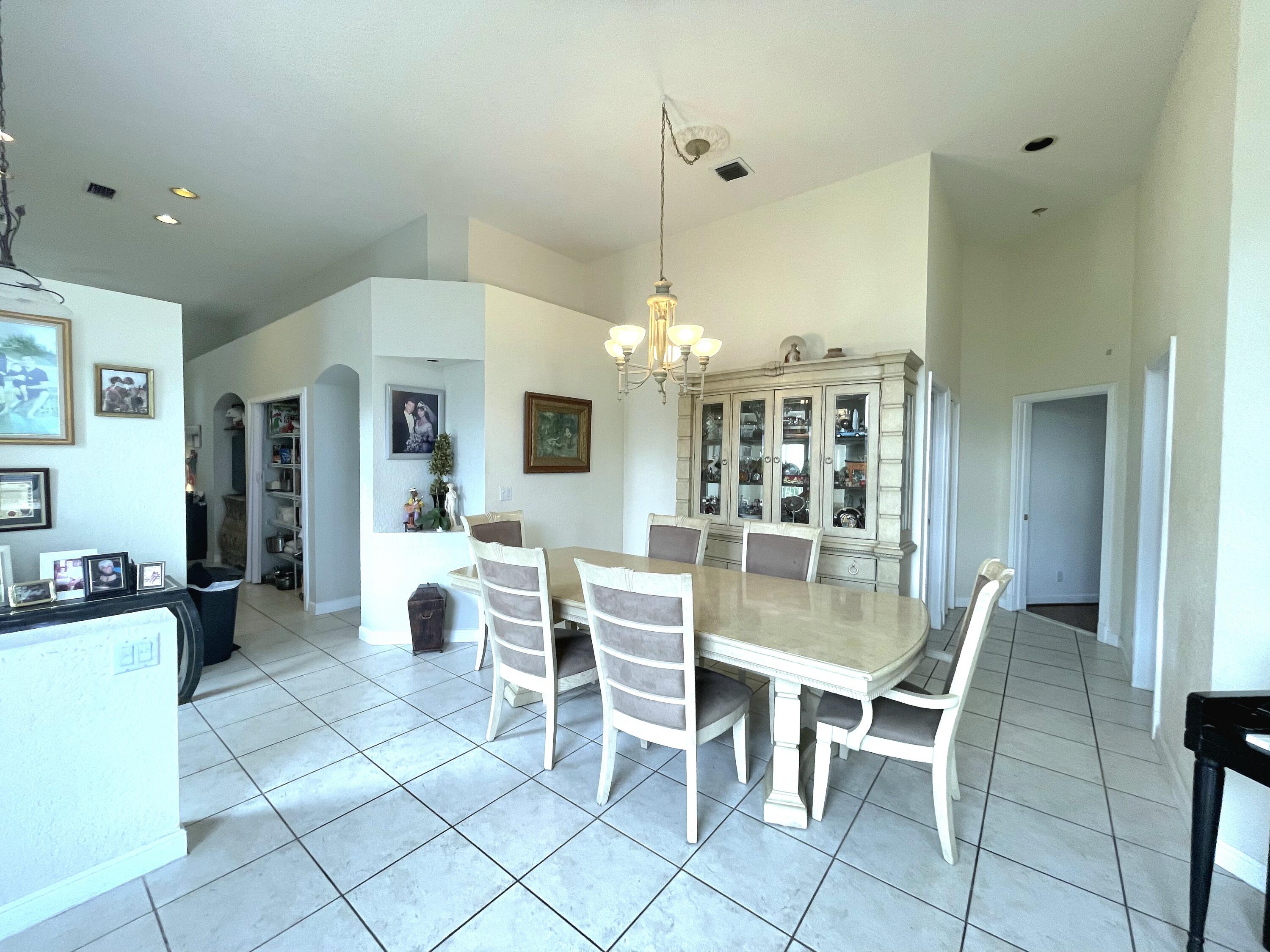 6616 Northwest 43rd Terrace Boca Raton, FL 33496 - Photo 8 of 16 C3E4F4CB-F346-44F7-86C5-F04701B68C