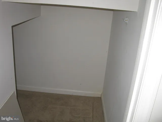 a stove top oven sitting inside of a kitchen