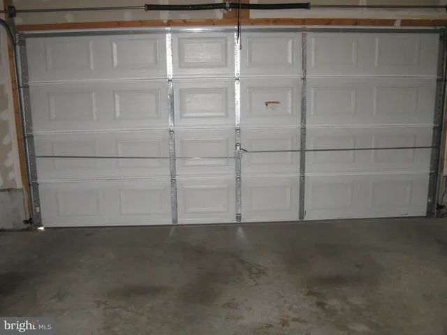 a stove top oven sitting inside of a kitchen