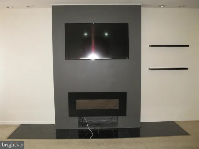 a close view of laundry room with furniture