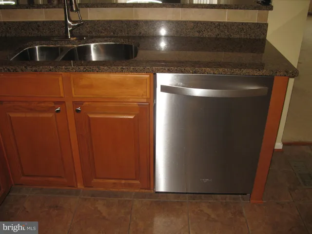 a bathroom with a toilet and a sink