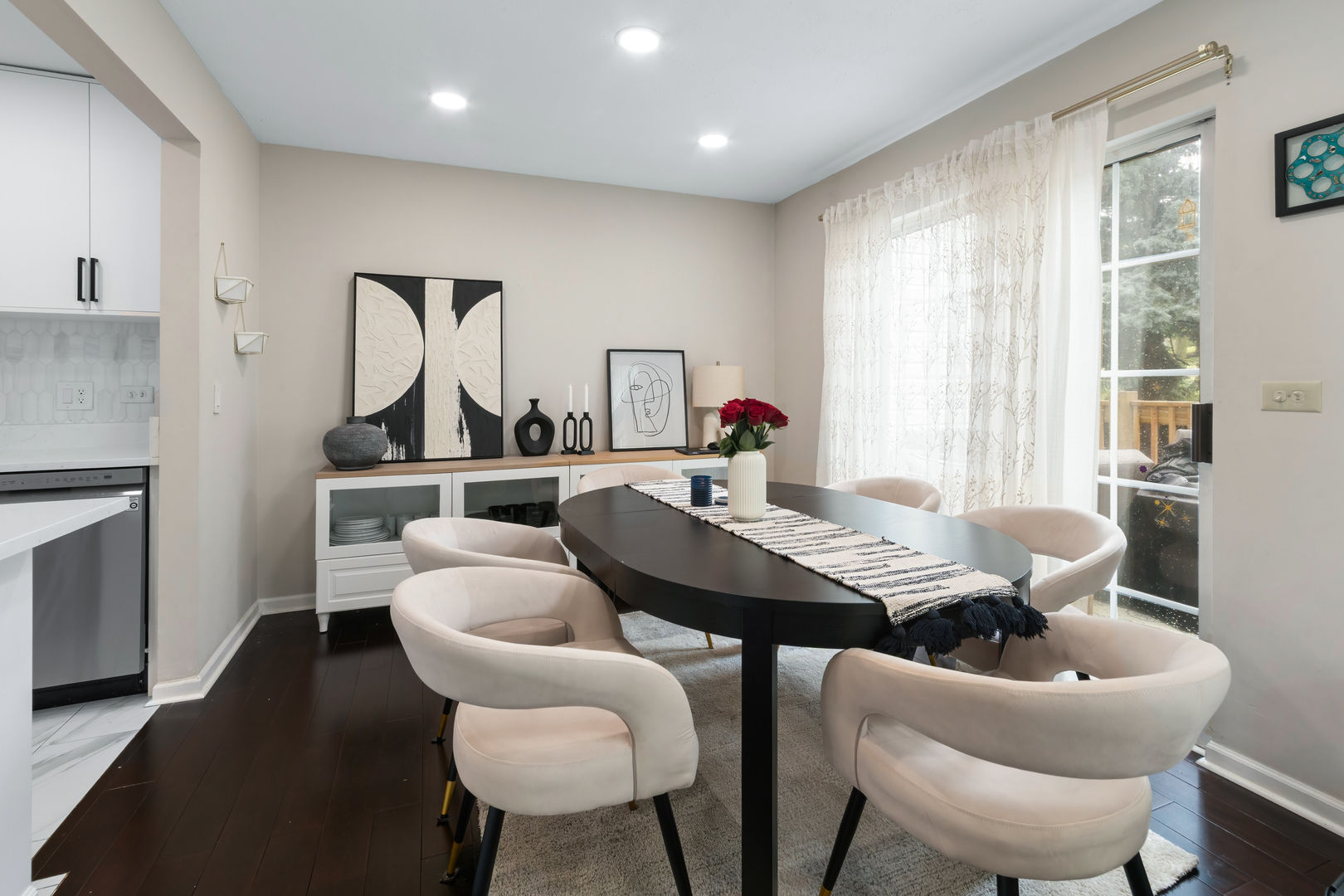 2140 Seaver Lane Hoffman Estates, IL 60169 - Photo 6 of 25 a view of a dining room with furniture and a large window